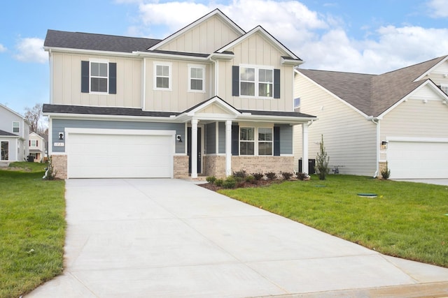 craftsman inspired home with a garage, a front yard, and covered porch