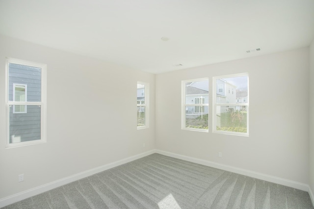 unfurnished room with carpet