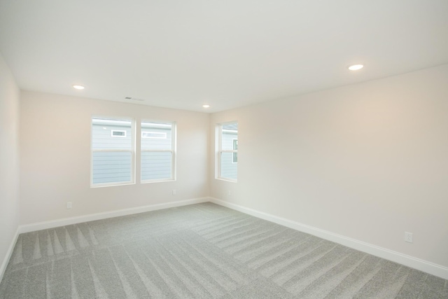 spare room with carpet flooring