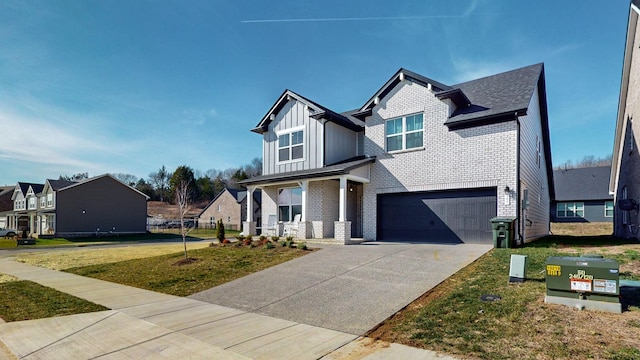 craftsman-style house featuring a garage and a front lawn