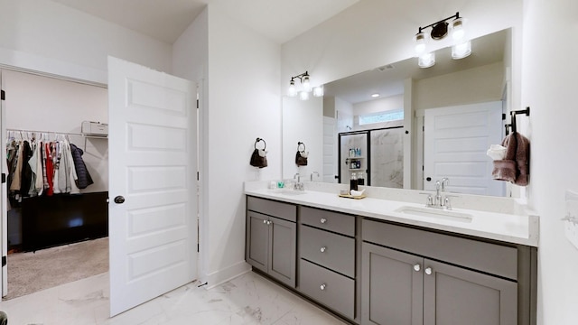 bathroom with walk in shower and vanity