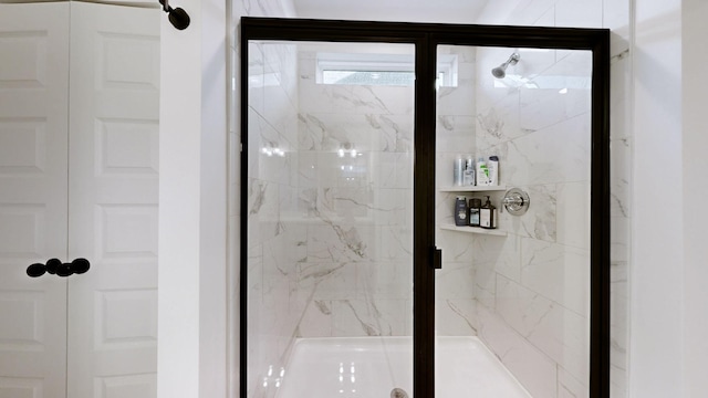 bathroom featuring an enclosed shower