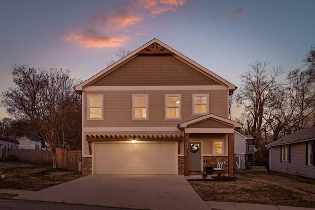 view of front of property featuring a garage