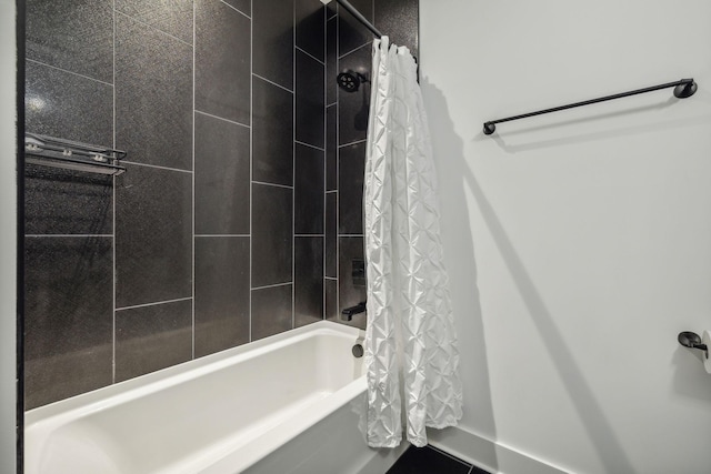 bathroom with shower / bath combo