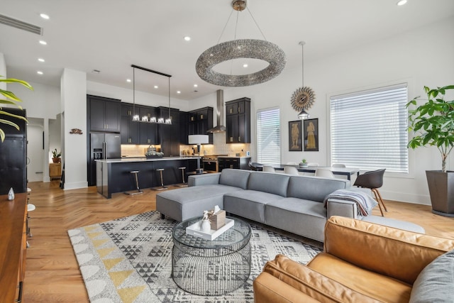 living room featuring light parquet flooring