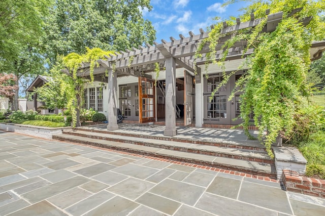 view of patio featuring a pergola