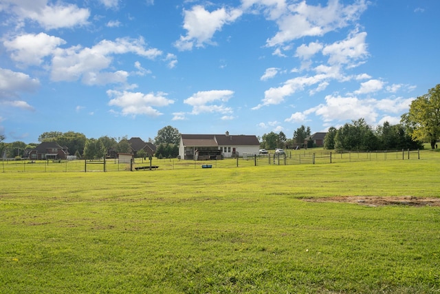 view of yard with a rural view