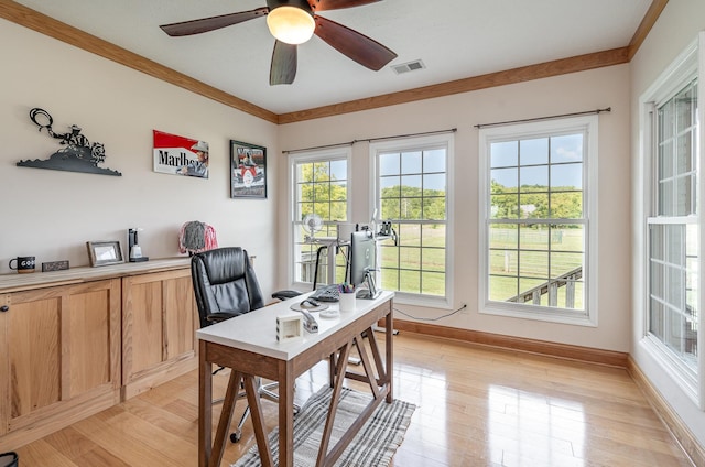 home office featuring crown molding, ceiling fan, and light hardwood / wood-style flooring