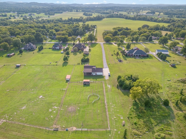 birds eye view of property featuring a rural view