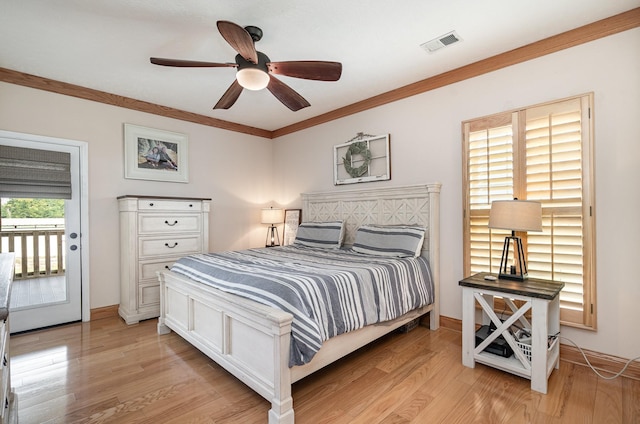 bedroom featuring ornamental molding, access to exterior, ceiling fan, and light hardwood / wood-style floors