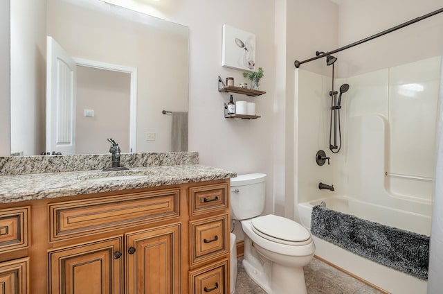 full bathroom featuring vanity, tub / shower combination, and toilet