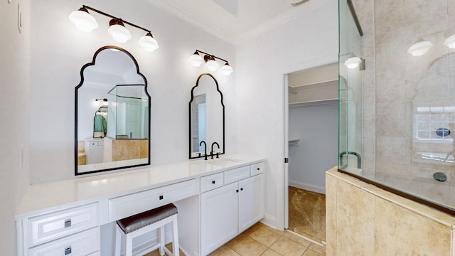 bathroom with walk in shower, tile patterned floors, ornamental molding, and vanity