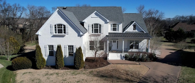 view of front of property featuring covered porch