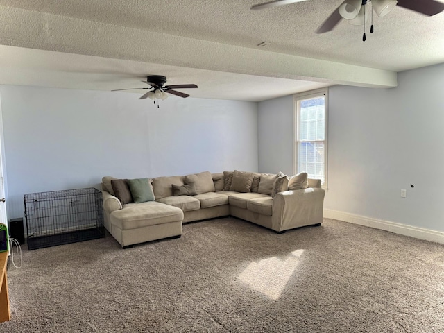 carpeted living room featuring a textured ceiling and ceiling fan