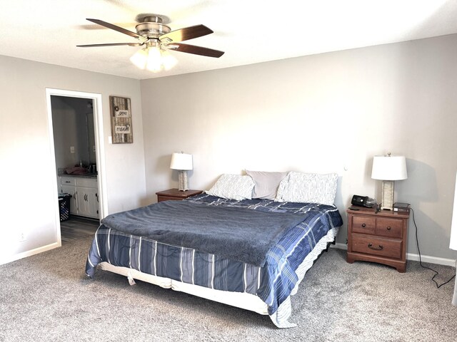 carpeted bedroom with ceiling fan and ensuite bathroom