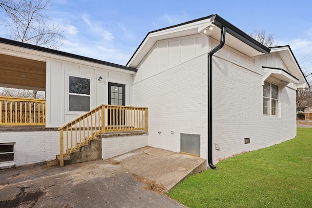 view of home's exterior featuring a lawn