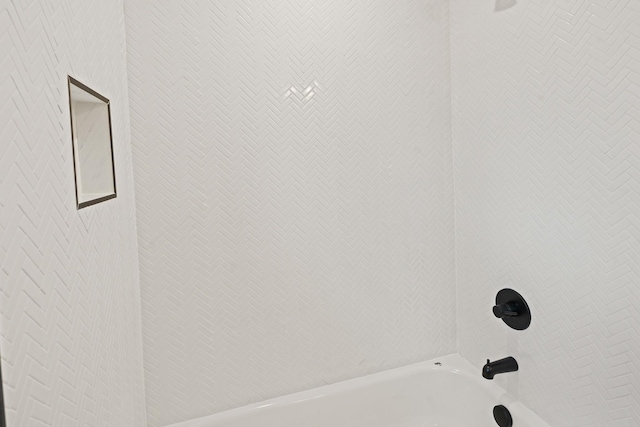 details with tiled shower / bath