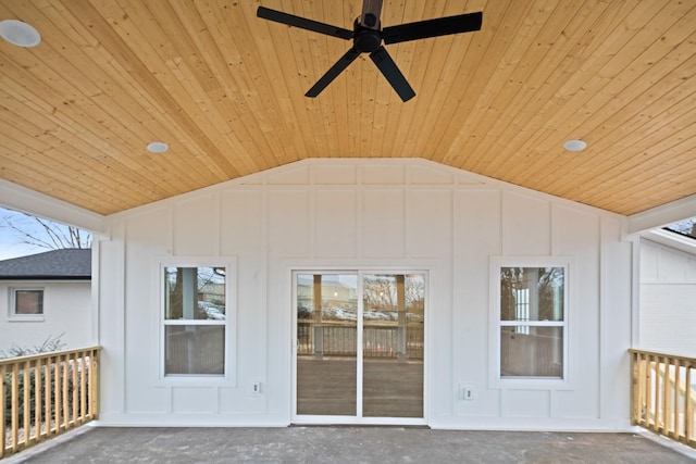 exterior space with ceiling fan