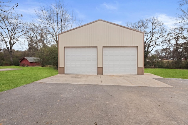 garage with a yard