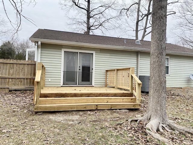 back of house featuring a wooden deck and central AC unit