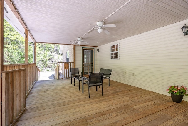 wooden deck with ceiling fan