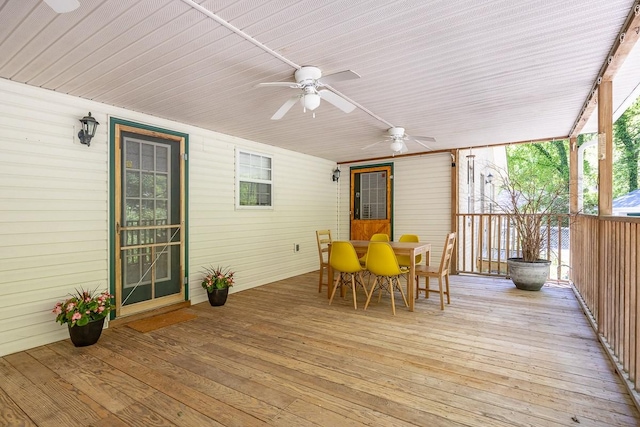 wooden deck featuring ceiling fan