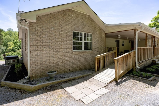 view of home's exterior with covered porch