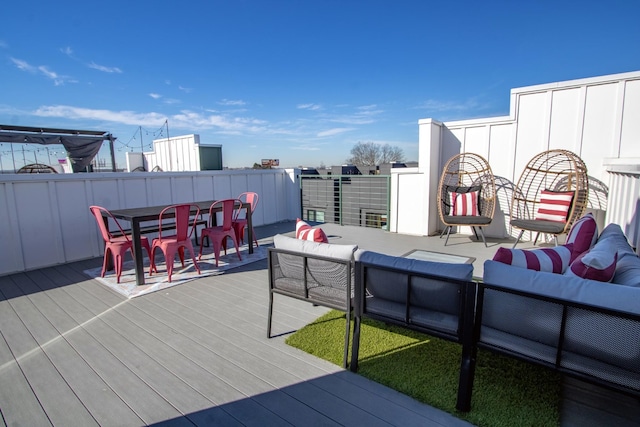 wooden deck with outdoor lounge area