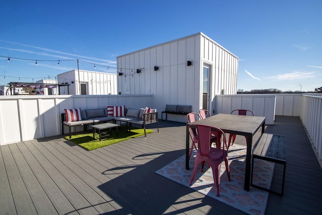 deck with outdoor lounge area