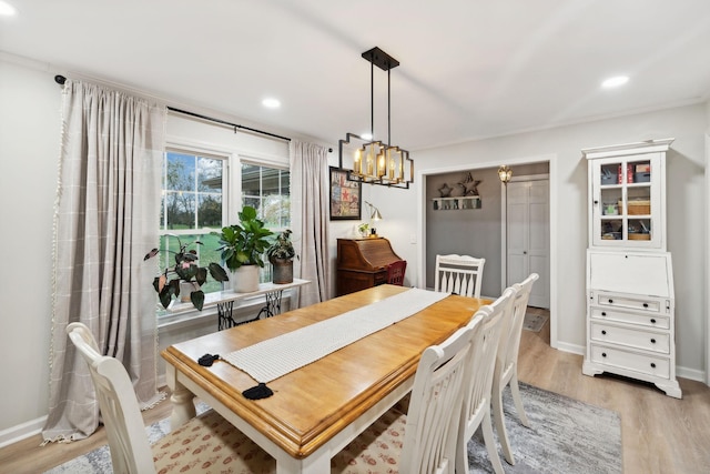 dining room with wood-type flooring