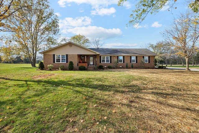 ranch-style home with a front yard