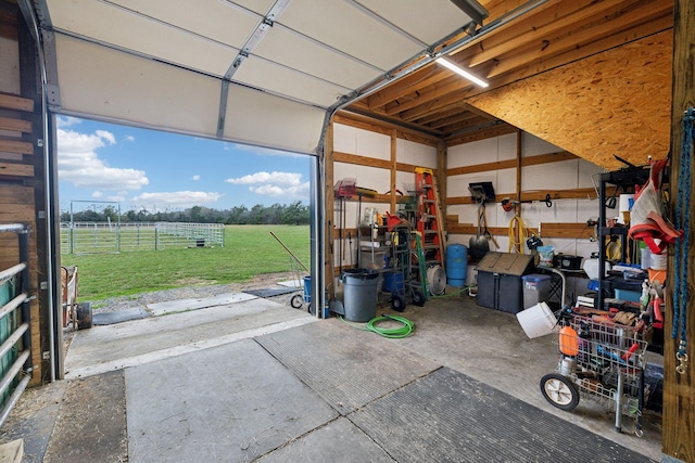 garage featuring a rural view