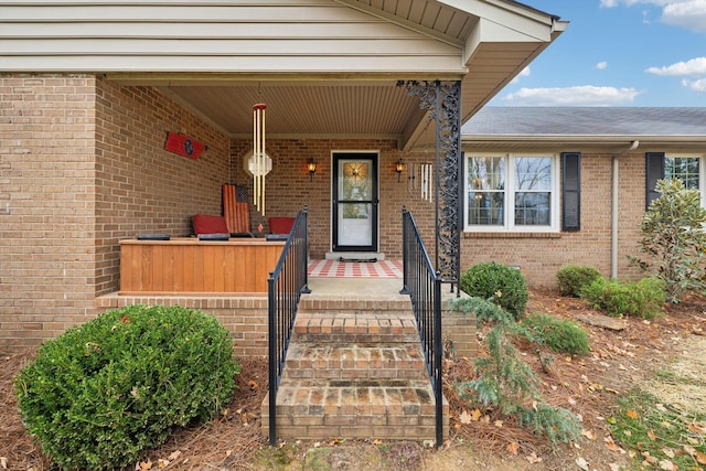 doorway to property with a porch