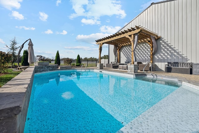 view of swimming pool with a patio area