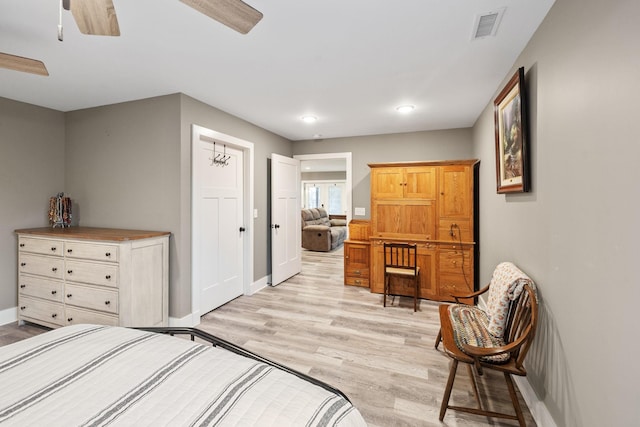 bedroom featuring ceiling fan and light wood-type flooring