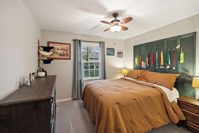 carpeted bedroom featuring ceiling fan