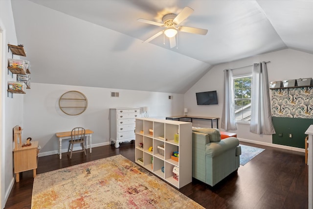 interior space featuring lofted ceiling, dark hardwood / wood-style floors, and ceiling fan