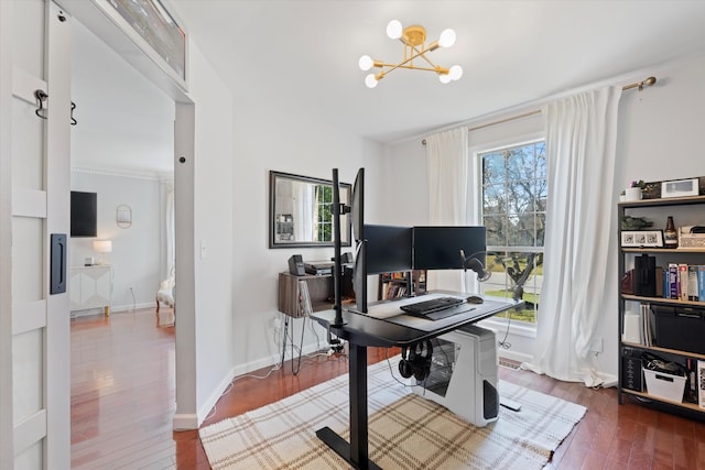 office space featuring dark wood-type flooring and a chandelier