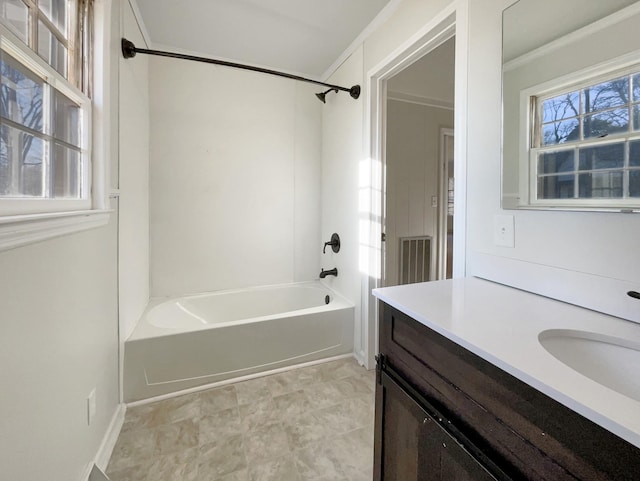 bathroom with shower / bathtub combination, ornamental molding, and vanity