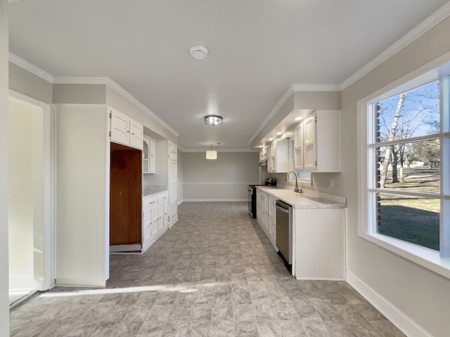 kitchen with crown molding, appliances with stainless steel finishes, sink, and white cabinets