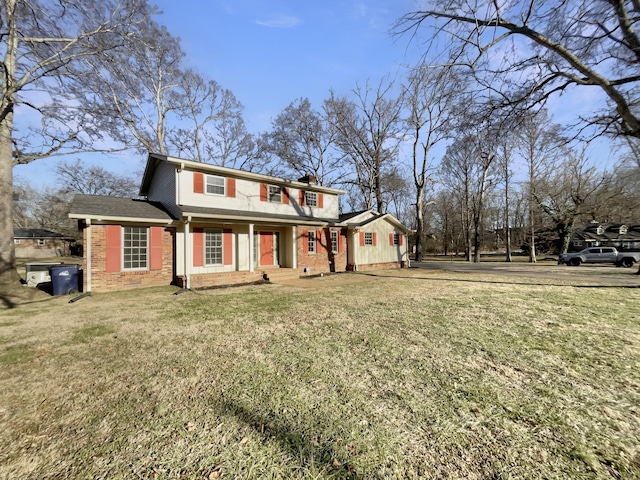 view of front of home featuring a front yard