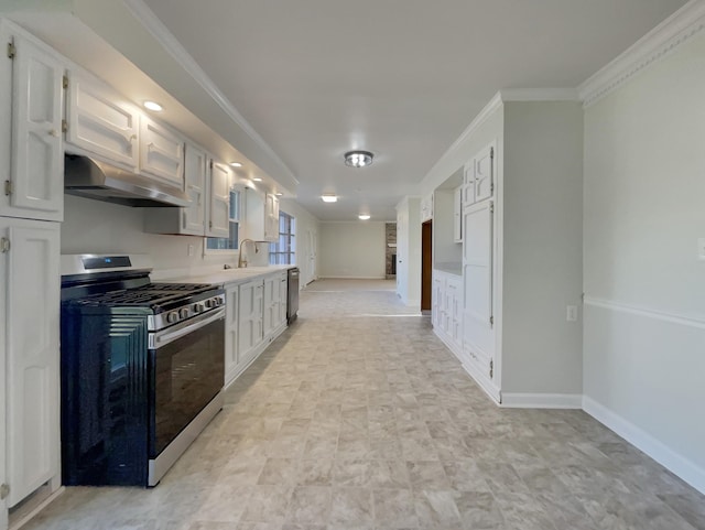 kitchen featuring crown molding, appliances with stainless steel finishes, sink, and white cabinets