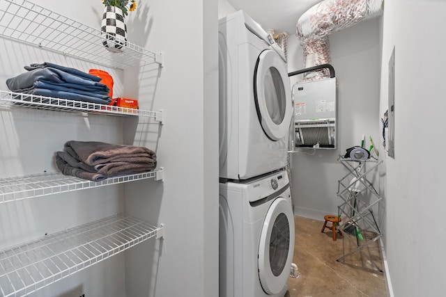 washroom featuring stacked washer and dryer