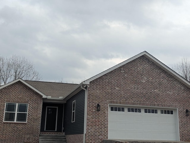 exterior space featuring a garage