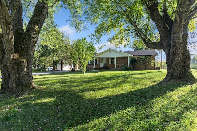 view of front of property with a front lawn