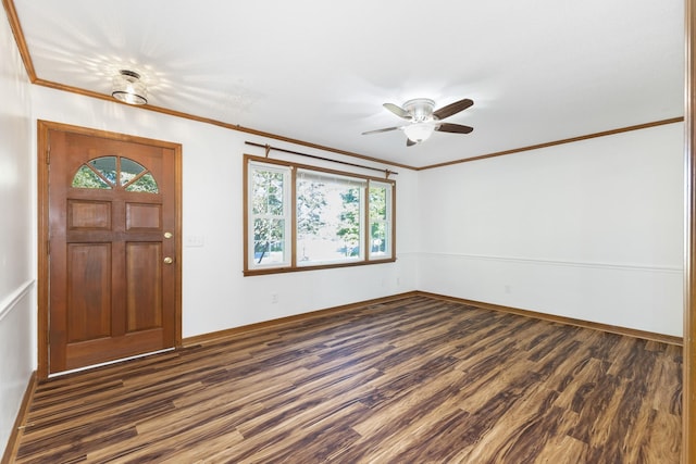 entrance foyer featuring crown molding, dark hardwood / wood-style floors, and ceiling fan