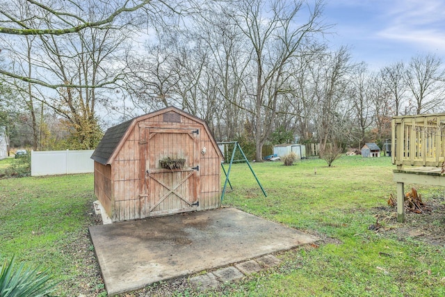 view of outbuilding featuring a yard