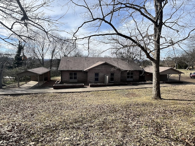 exterior space with a carport