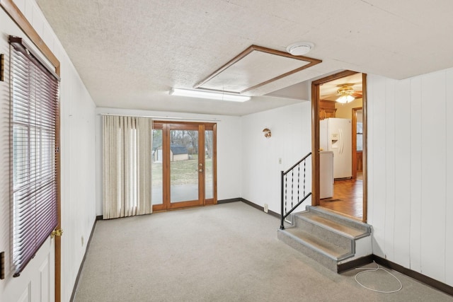 interior space with a textured ceiling