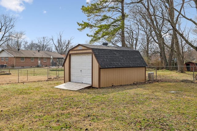 view of outdoor structure with a lawn